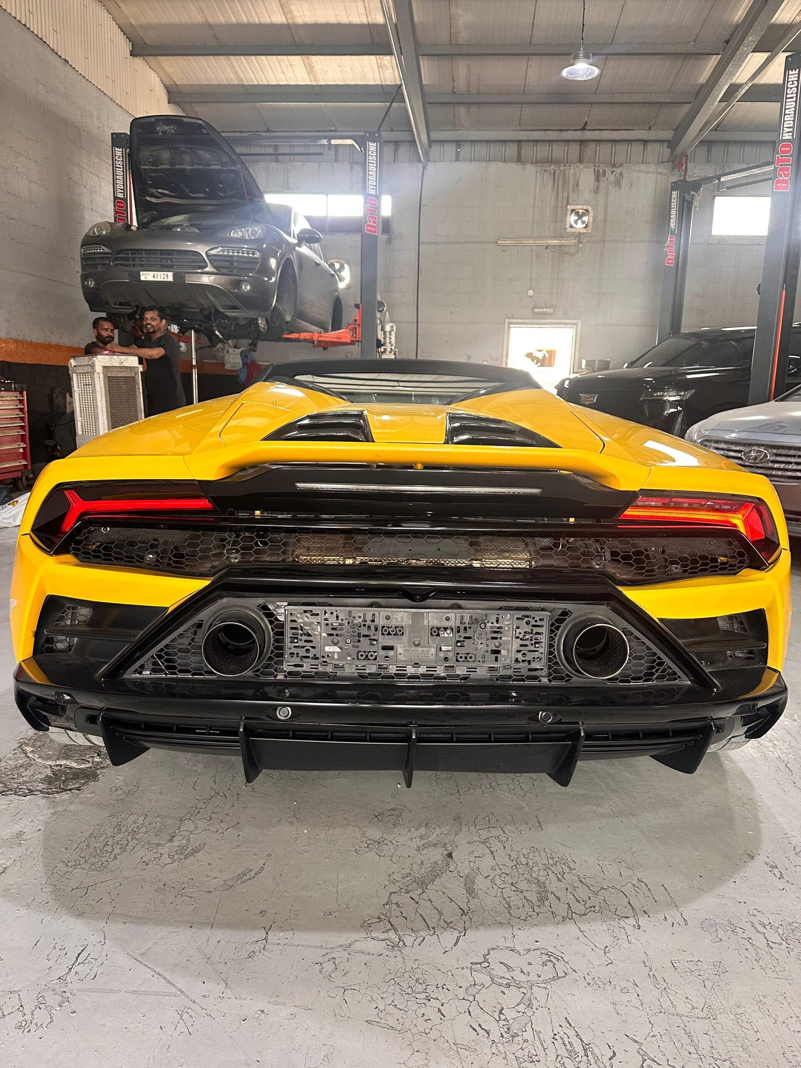 Lamborghini Huracan and Porsche at our Dubai workshop